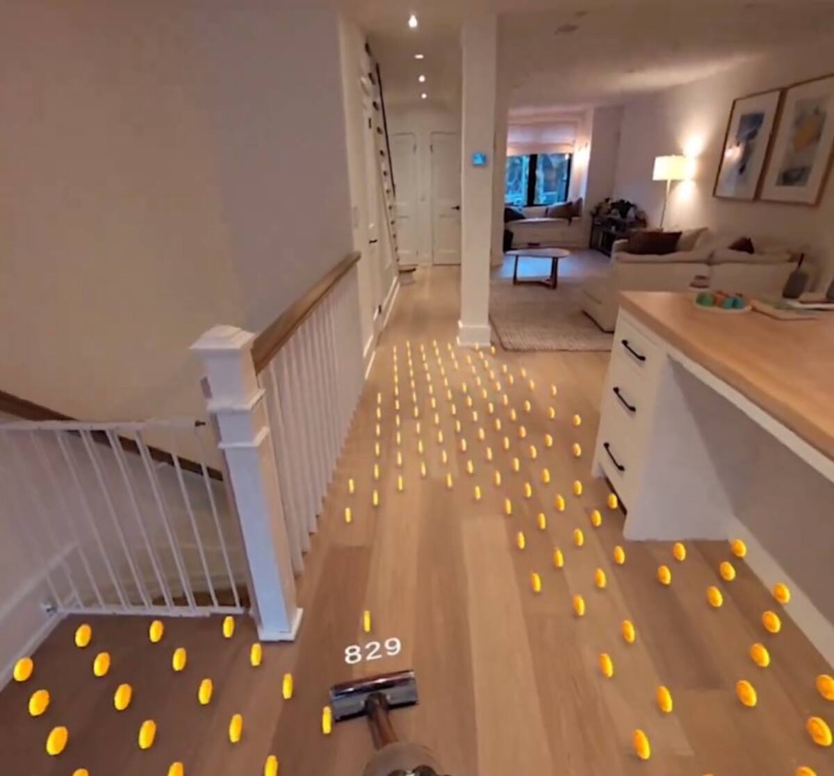 Labores domésticas como aspirar pueden cobrar un toque divertido con los Apple Vision Pro y sus modos para simular juegos entretenidos.